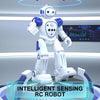 A white robotic figure with blue accents stands on a platform, demonstrating intelligent sensing capabilities.