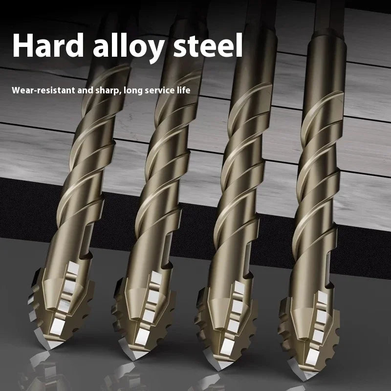 A set of four hard alloy steel serrated drill bits shown against a dark background.