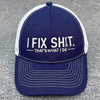 Navy baseball cap with white embroidery that reads I FIX SHIT THAT'S WHAT I DO