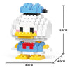 A white and blue micro building block figurine of a duck, showing its size dimensions.