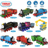 A collection of Thomas & Friends diecast train engines including Gordon, Emily, Hiro, and others.