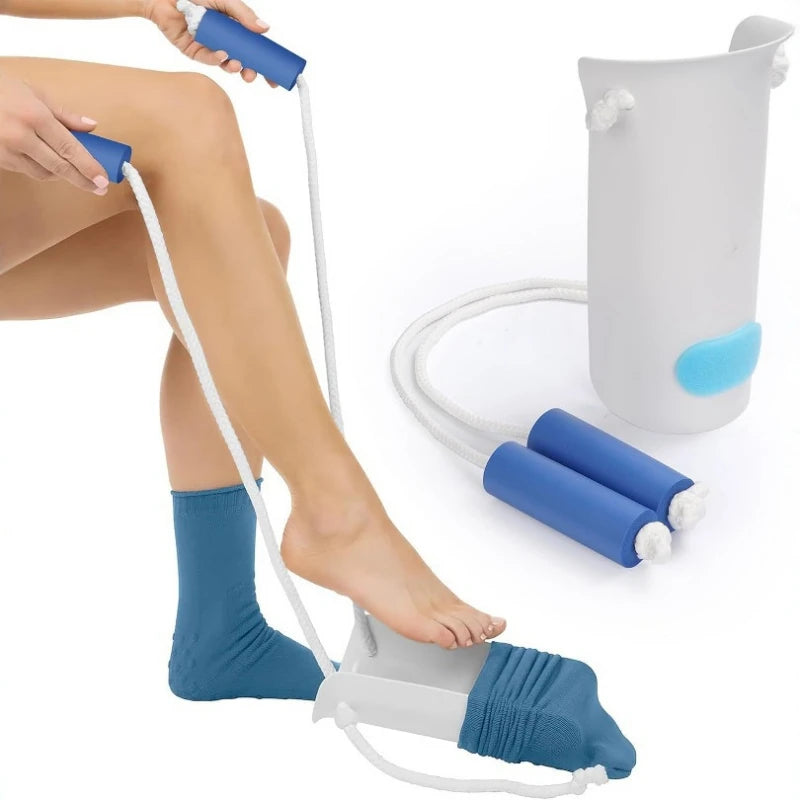 A hand is applying a blue sock aid to a person's foot using a white strap and a separate device.