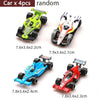 A set of four random, friction-powered DIY race track cars in various colors and designs.