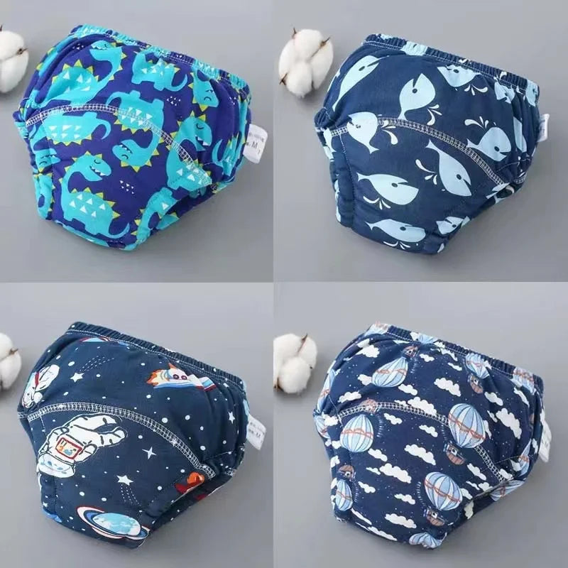 A pack of reusable cotton potty training pants for toddlers in various blue and purple patterns.