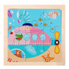 A colorful wooden jigsaw puzzle featuring dinosaurs and sea creatures on a light background.