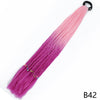 A long, pre-braided ponytail extension featuring a pink to purple gradient color transition with an elastic band.