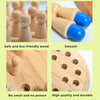 Wooden memory match sticks with blue and natural wood grips shown alongside a wooden chess piece and a wooden board