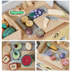 A wooden pretend play food cutting set with various colored and shaped pieces for kids.