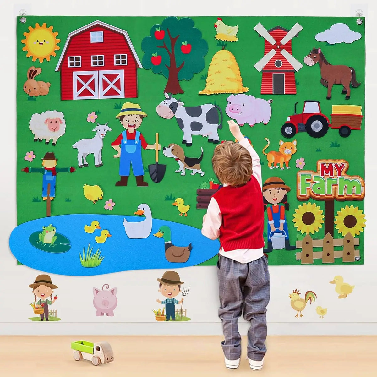 A felt story board featuring various farm and zoo animals like a pig, cow, sheep, dog, and chicks.