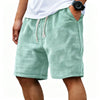 Shorts casual para hombre en color verde menta claro, textura gofrada y cordón ajustable