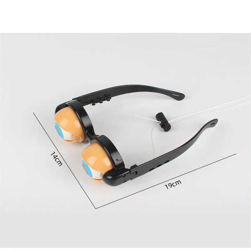 A pair of black novelty glasses with orange lenses and a thin wire strap are shown against a white background.