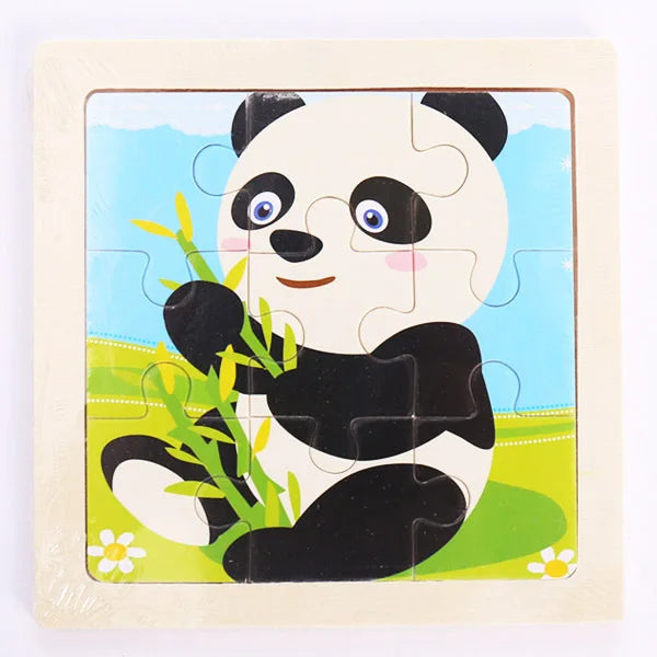 A jigsaw puzzle featuring a cute panda face surrounded by green grass and yellow plants.