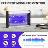 A white and black electric mosquito killer lamp with a blue LED violet wave light trap is displayed on a gray surface.