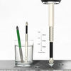 A magnetic PH2 screwdriver bit set with a 1/4 inch hex shank is shown next to a glass of water.