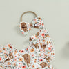 A floral cow print baby romper and matching headband