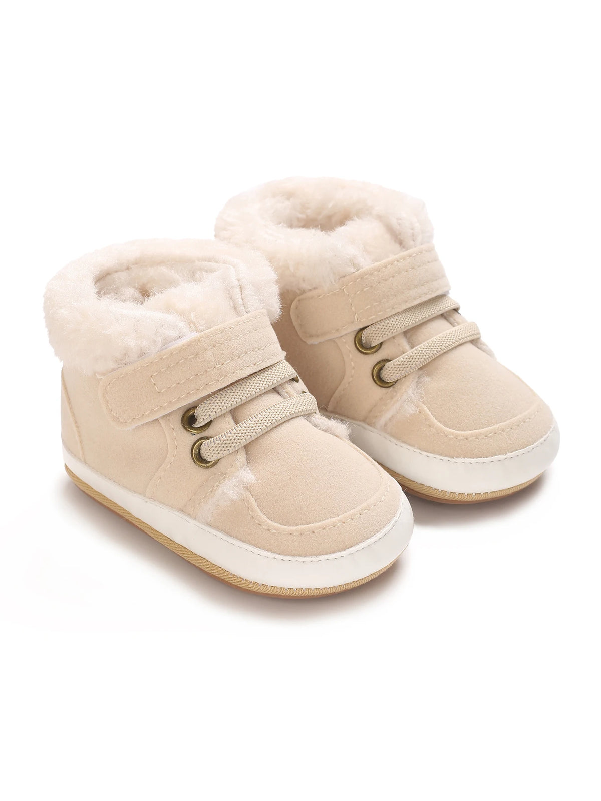 Pair of beige faux fur baby winter snow boots for toddlers with light tan leather accents