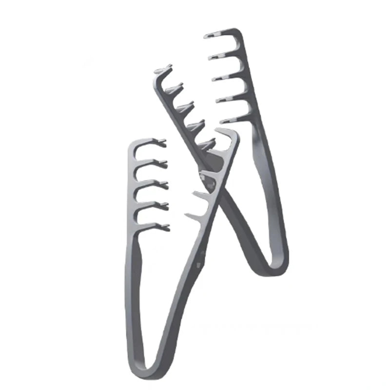 A silver volumizing wide-tooth styling comb with a seam covering design.