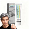 A bottle of Hoegoa Silver Dye permanent hair color cream next to its packaging and a man looking at the product.