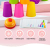 Colorful stacking cups and challenge cards for a tabletop game designed to improve color cognition, logical thinking, and han