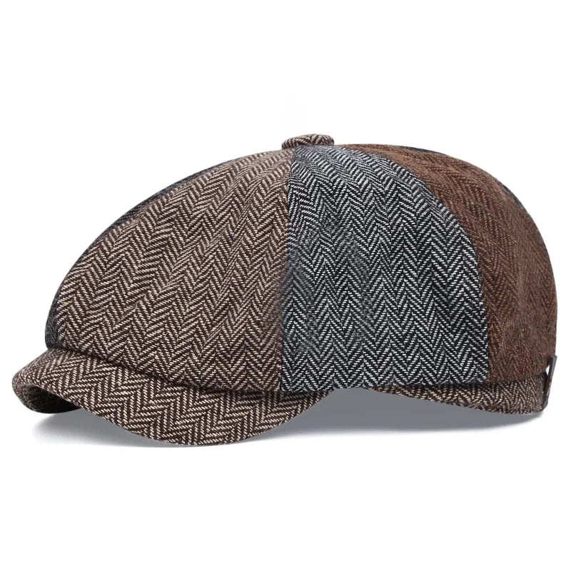 A brown and gray tweed newsboy cap with a folded brim shown in a profile view.