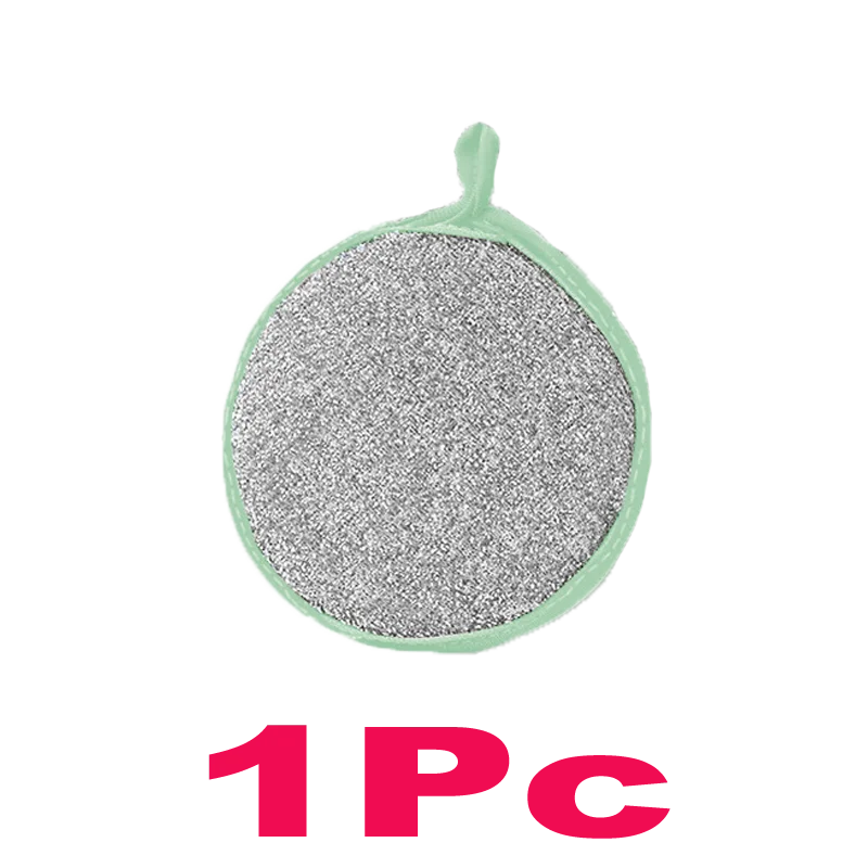 A round, light green dish sponge with a small handle is shown against a black background.