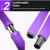 Close-up view of a purple foam wrapped metal tube used as a Pilates bar or resistance tool.