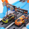 A DIY stunt car racing track set featuring orange and yellow cars on a gray track with blue launchers.