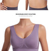 A purple breathable plus size sports bra is shown being worn by a model.