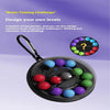 A black puzzle ball with various colored spheres is shown, featuring a hanging hook and a question mark graphic.