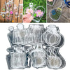 A collection of transparent glass bookmarks featuring dried flowers and various designs.