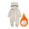 A light gray baby fleece hooded romper with a zipper, shown next to a flame.
