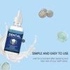 A bottle of Dental Cavity Healing Tooth Armor drops is shown with a drop on a white surface.