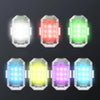 A set of five wireless LED strobe lights displayed in various colors including white, red, green, blue, and purple.