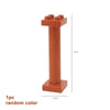 A single orange marble run building block piece with a cylindrical track and funnel.
