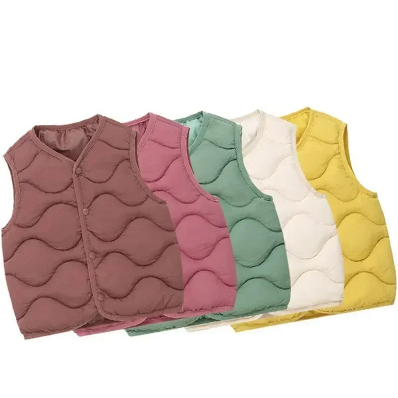 A collection of five kids solid color warm cotton vests in shades of mauve, pink, mint green, and yellow.