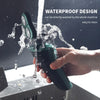 A hand is holding a green electric shaver being washed under running water, demonstrating its waterproof design.