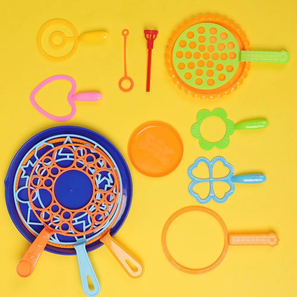 A collection of colorful bubble wands and bubble toys including a large orange disk and various shaped plastic tools.