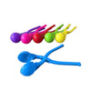 A collection of colorful duck-shaped rice molds in purple, pink, red, green, and yellow.
