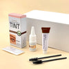 A box and applicator for an Iconsign Tint Eyebrow & Eyelash Tint kit with a brush shown on a light background.