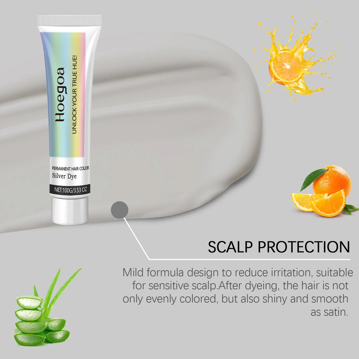 Tube of Hoegoa permanent hair color dye next to an orange slice and aloe vera plant showing scalp protection benefits