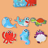 A box of large chunks puzzles featuring colorful sea creatures like an octopus, fish, and a hedgehog.