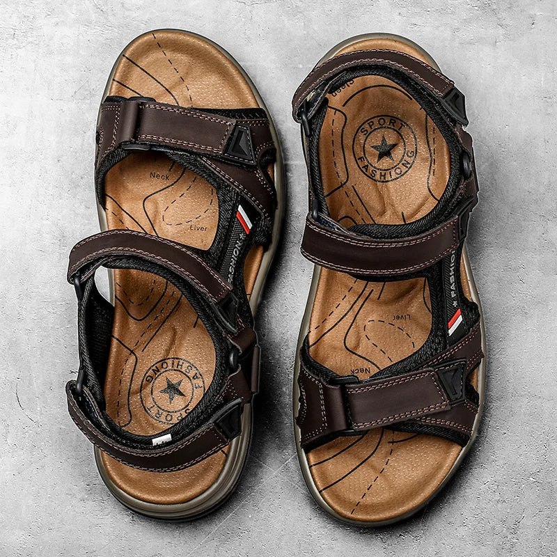 Pair of brown men's genuine leather air cushion sandals with black straps and wooden-look soles.
