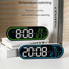 A black digital temperature switching device displays 8:08 PM and a temperature of 23 degrees Celsius.