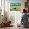 En mann sitter på gulvet og ser på en kalender med tittelen 2027 Dogs Pooping in Beautiful Places, med en hund i nærheten.