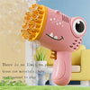 A pink dinosaur-shaped bubble gun with a yellow nozzle is shown next to a potted plant.
