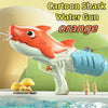 An orange cartoon shark water gun is shown against a green background with small mushrooms and a water surface.