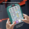 Hands hold a green light-up runway acceleration game board with rhythm markers.