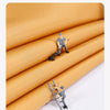A miniature figure is shown on a rolled-up fabric, demonstrating the waterproof fabric material.