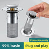 Silver press-type sink drain stopper with a mesh core and a removable cap