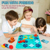 Children playing with a blue logical road building maze board game featuring colorful plastic pieces.